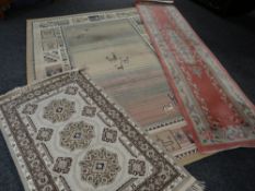 A Chinese woollen pink & fawn runner together with a large modern geometric patterned rug &