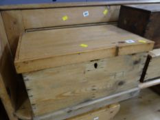 A small pine chest with metal carry handles