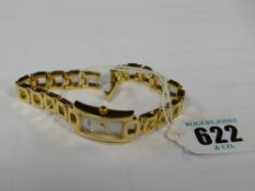 A modern yellow metal rotary ladies wristwatch with geometric linked bracelet & curved white dial