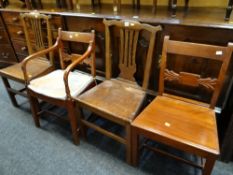 A pair of oak splat back farmhouse chairs together with two reproduction dining chairs