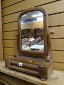 A small mahogany toilet mirror