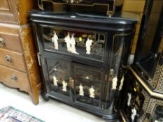 A lacquered gold painted & relief decorated drinks cabinet (matching previous lot) Height 105cms