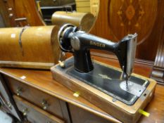 A vintage cased Singer sewing machine