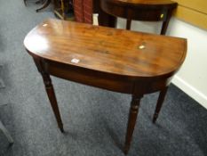 A mahogany & ebonized banded D-end foldover card table