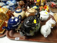 Collection of various teapots