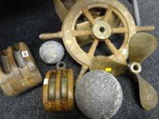 Collection of nautical items including small ship's wheel, brass propeller, metal floats & wooden