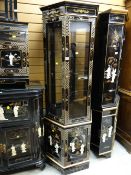 A modern lacquer gold painted & relief decorated illuminated octagonal glass shelved display cabinet