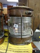 A copper & glass mast head light converted to an electric lamp E/T