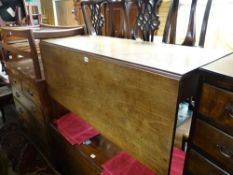 Eight early nineteenth century mahogany drop leaf table (with one flap)