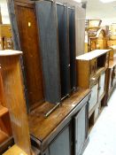 An early twentieth century rosewood chiffonier with open shelf top with brass supports