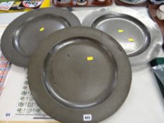 Three large pewter chargers