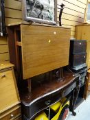 A parcel of furniture to include a vintage light oak drop leaf dining table, bow fronted console