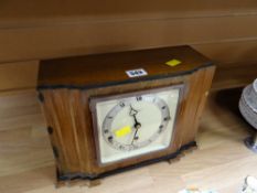A vintage Deco-style mahogany & ebonised mantel clock