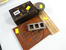 A wooden solitaire board & counters, folding cribbage board & hallmarked silver counter holder etc