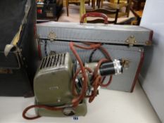 A vintage cased Aldis slide projector
