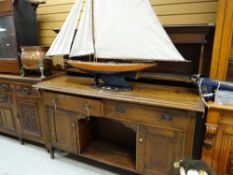 Late nineteenth century oak dresser with two-drawer, two-cupboard open centre base