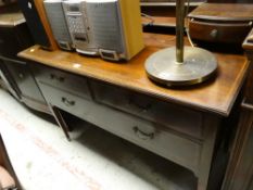 An Edwardian mahogany & inlaid dressing table with three drawers