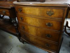 A Reprodux reproduction mahogany Georgian style bow fronted chest of four drawers