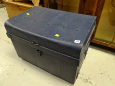 A vintage painted blue metal trunk