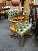 A modern green leather button backed & seated captain's chair