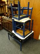 A parcel of blue painted furniture including glass top coffee table, folding chairs, folding chair