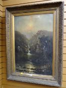 An early twentieth century framed oil on canvas of a waterfall