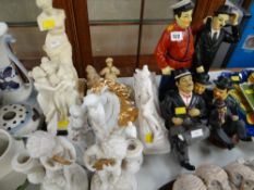 Pair of Franklin Mint cherub candle holders & other figures including Laurel & Hardy etc