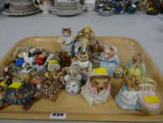 Nine Beswick Beatrix Potter figures, parcel of Wade Whimsies etc