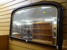 A vintage hardwood wall mirror with carving & gilt surround