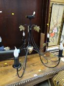 A large modern black metal & brass effect five-branch ceiling light