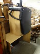 A modern office desk, desk chair etc