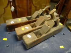 Three vintage wooden planes