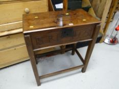 An antique oak carved raised Bible-box inscribed with initials 'S R' & 1723, height - 77cms,
