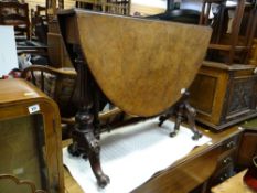 A vintage walnut topped & carved legged occasional table