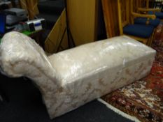 A modern pale pink silk upholstered chaise longue / ottoman