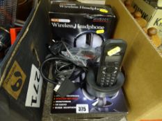 Two boxed sets of wireless headphones, Panasonic plug-in phone etc