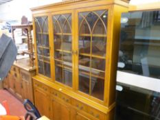 Modern compact light wood dresser with three upper glazed doors over three base cupboards and