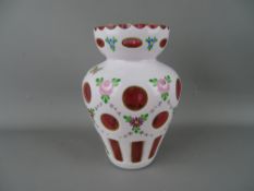 Bohemian cranberry glass cameo cut vase