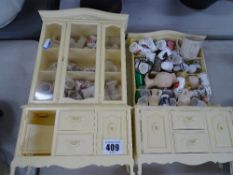 Two plastic/bakelite miniature furniture and a quantity of decorative thimbles