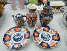 Pair of Imari plates, two similarly styled vases etc