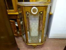 Drum shaped china cabinet with clock to front (proceeds to charity)