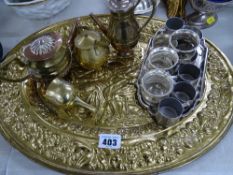 Brass tray with mixed metalware contents