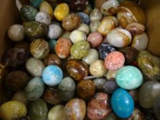 Box containing enormous quantity of onyx and similar ornamental eggs