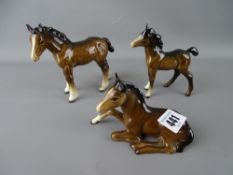 Three Beswick models of foals