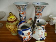 Pair of Imari chimney vases, two Ironstone jugs and a modern Satsuma jar and cover