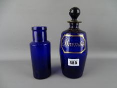 Antique Bristol blue glass brandy decanter and stopper (chipped) and a litre blue glass bottle