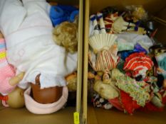 Two boxes of tourist and other dolls