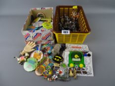 Small collection of action figurines and a boxed quantity of badges and keyrings etc