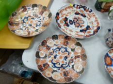 Pair of Imari wall chargers and one other