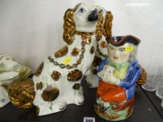 Pair of copper lustre decorated comforter dogs and an antique Toby jug (damages)